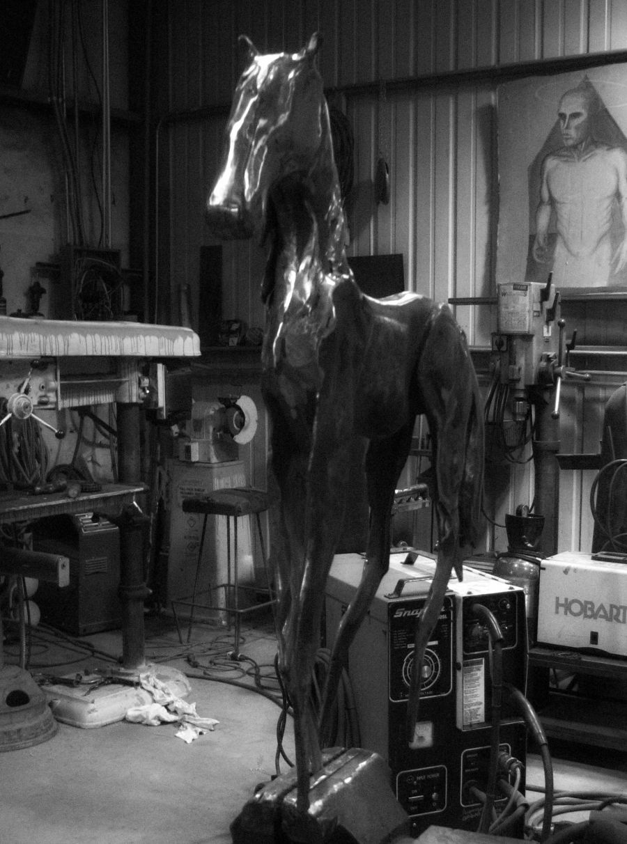 A horse in the metal shop
